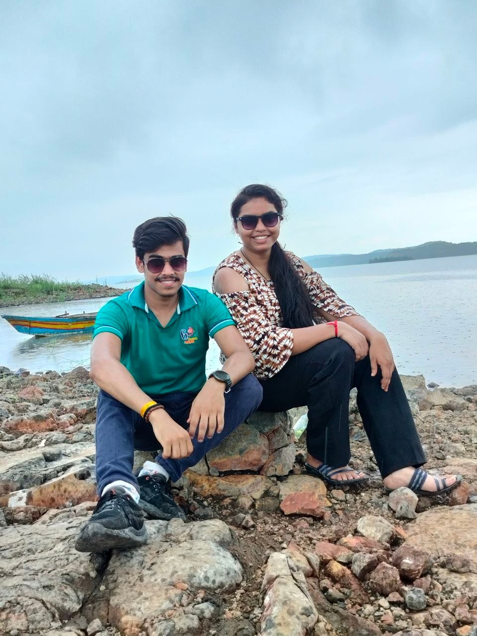 Sitting on the rocks by the lake